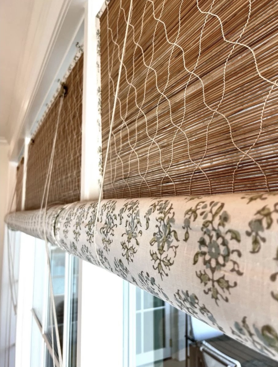 Close-up of woven bamboo blind texture with printed blind beneath