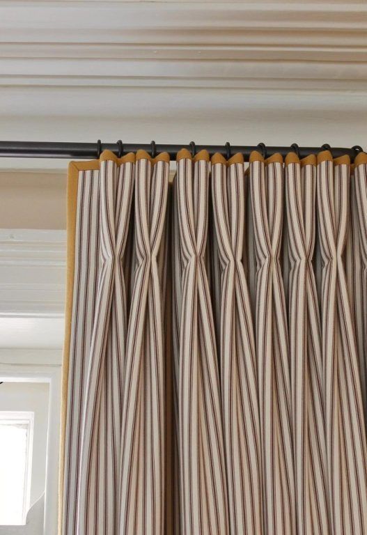 Pinch pleat heading on a decorative rod