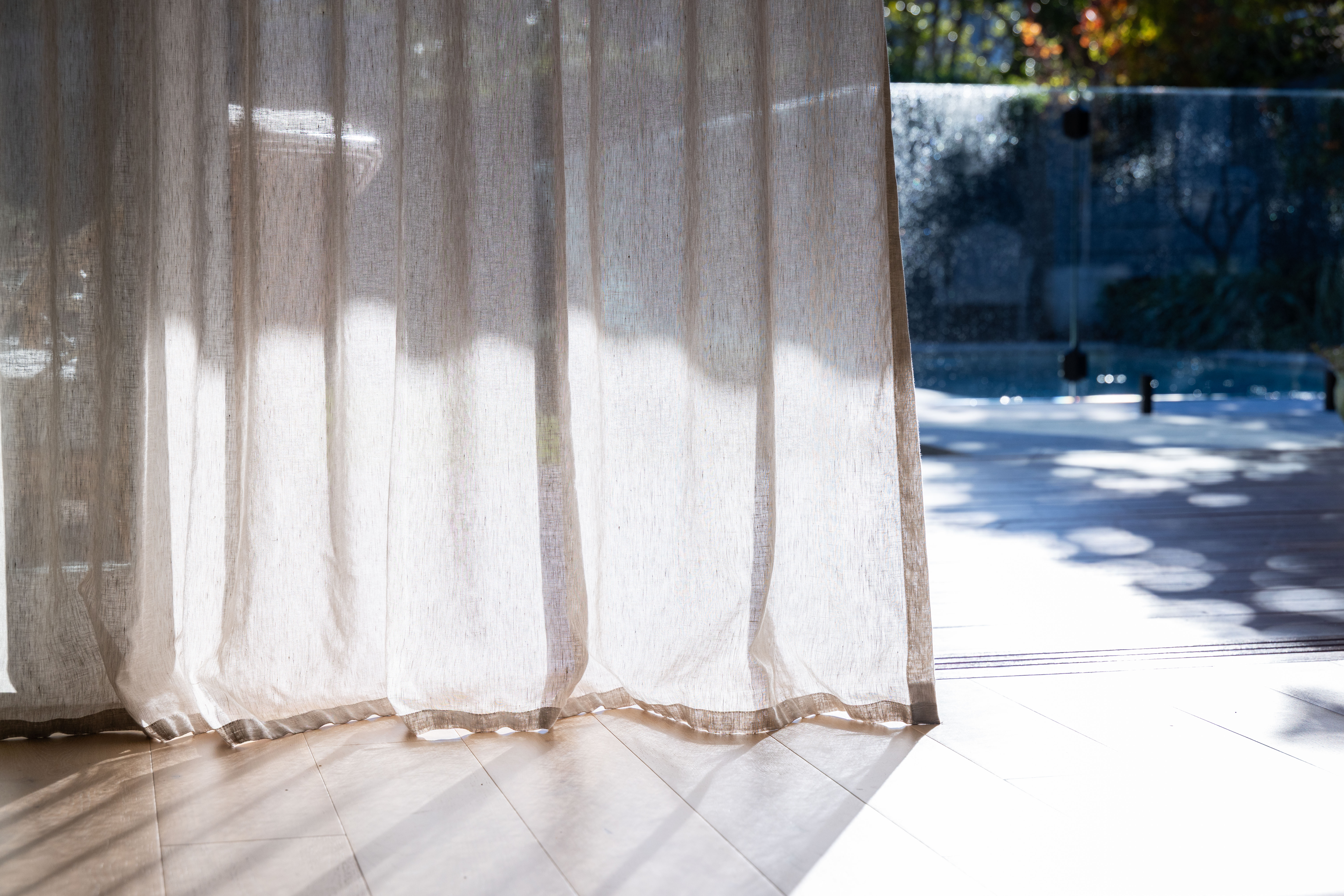 Sheer linen curtain with dappled light, Mosman project by The Style Workshop