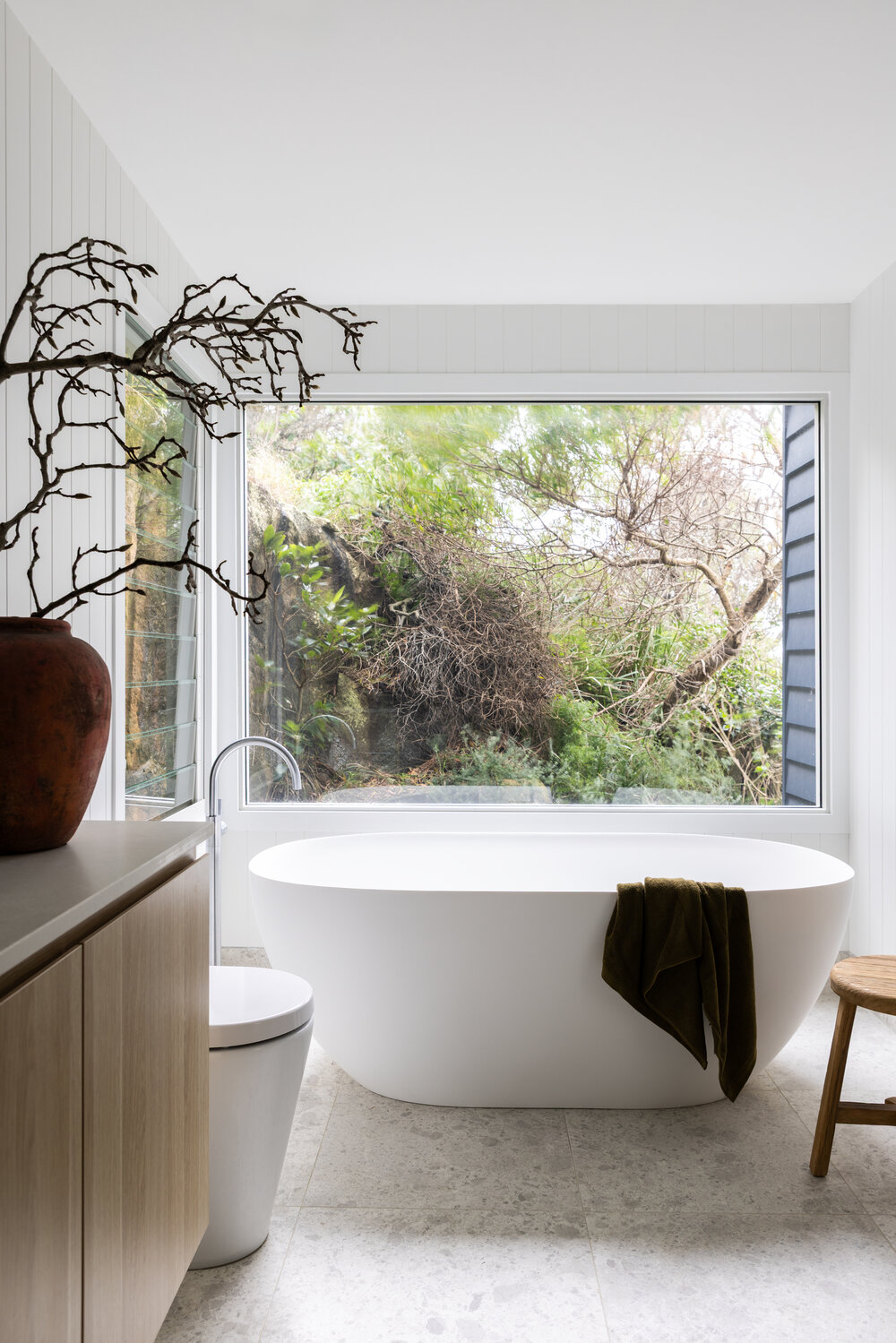 Whale Beach House ensuite with freestanding bath and garden outlook, The Style Workshop