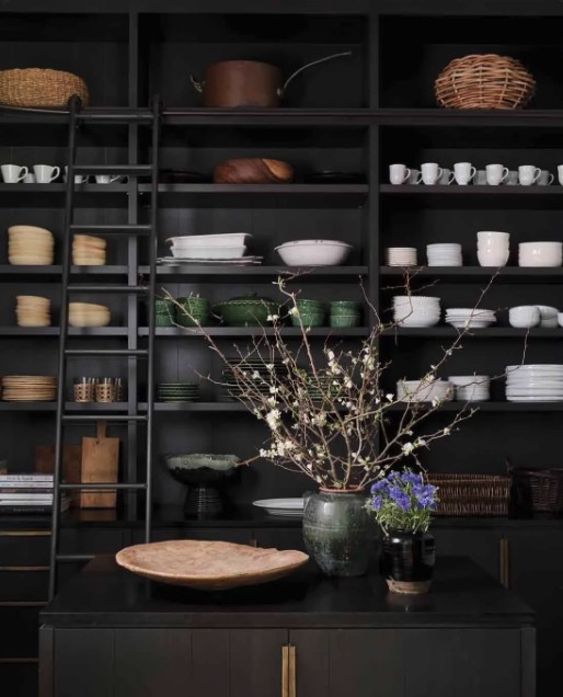 Dark butler's pantry shelving styled with a vase of blossom branches, The Style Workshop