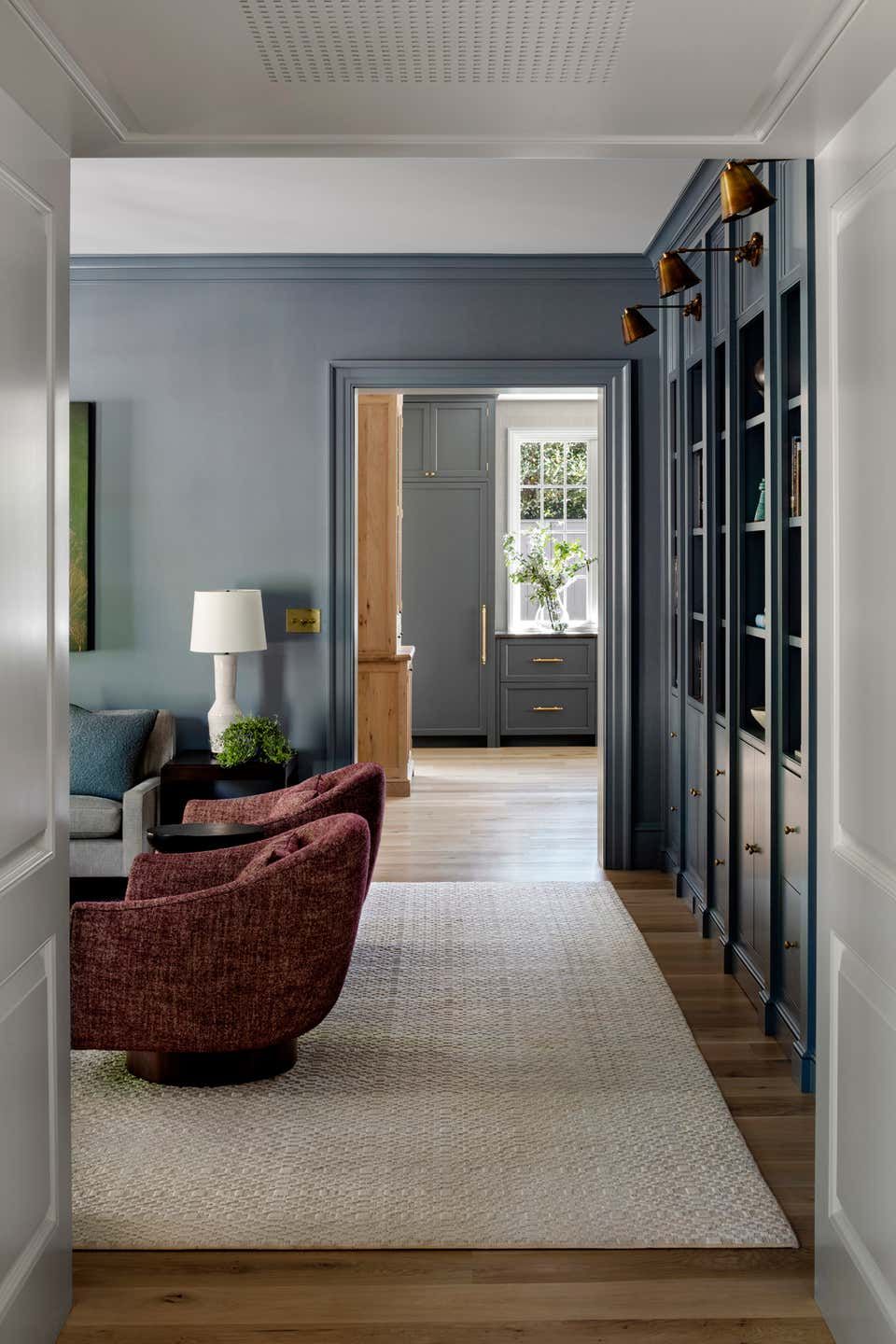 Woven wool rug underfoot with seating placed on top of it