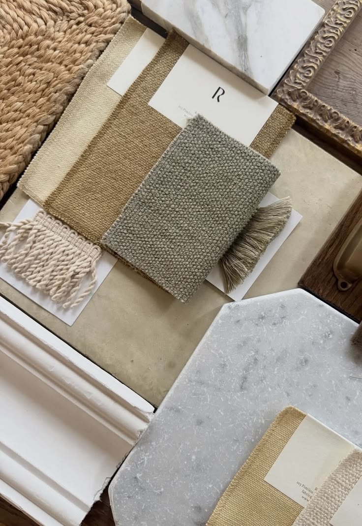 Tile, stone and fabric samples laid out for a renovation, The Style Workshop