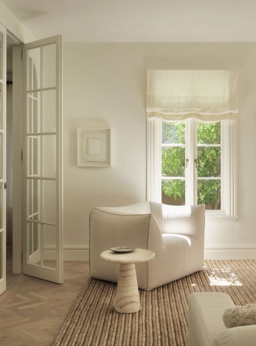 White joinery and fixed finishes in a considered interior