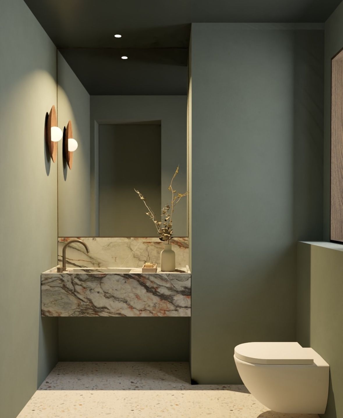 Sage green colour drenched powder room with marble vanity and terrazzo floor