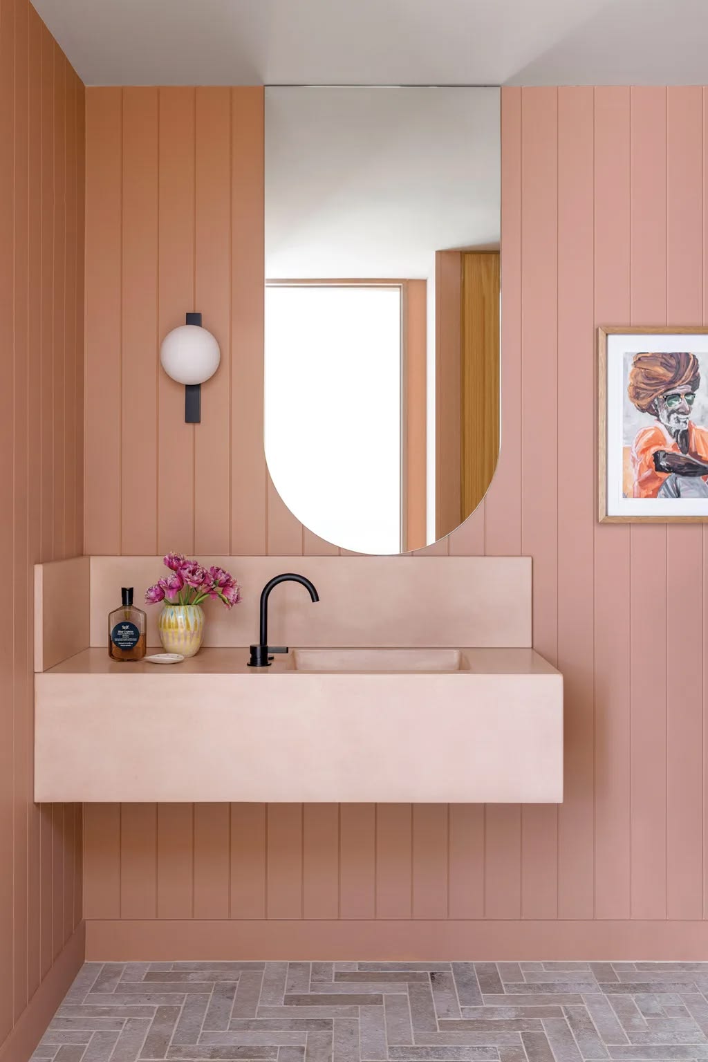 Terracotta panelled powder room with floating vanity