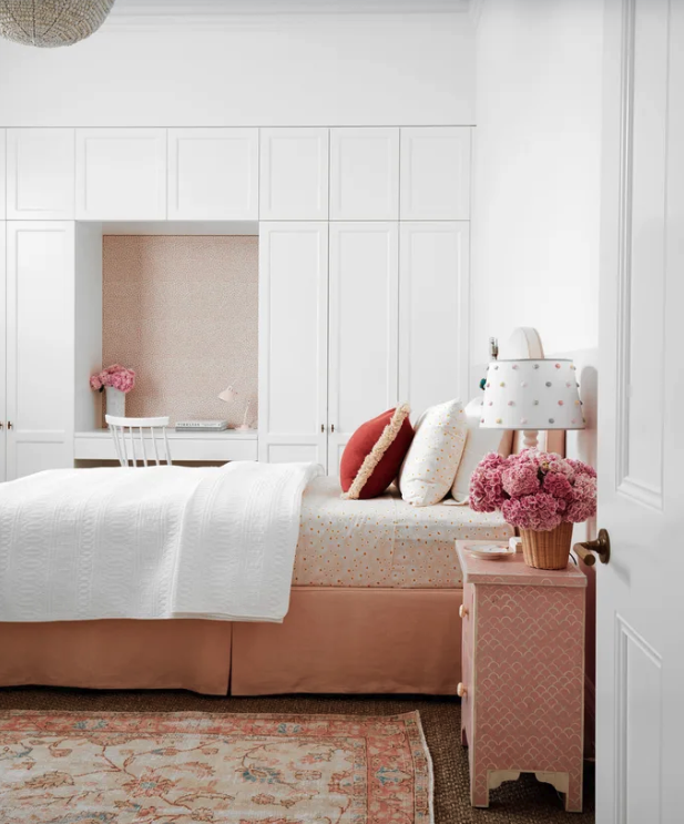 Floor-to-ceiling built-in wardrobe joinery with an integrated arched display nook, The Style Workshop